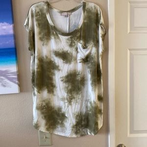 Pretty Shirt With Cap Sleeves. And front pocket.